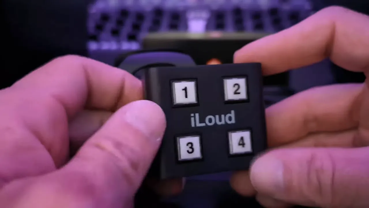 Metal remote control with four backlit buttons for ArcX functions
